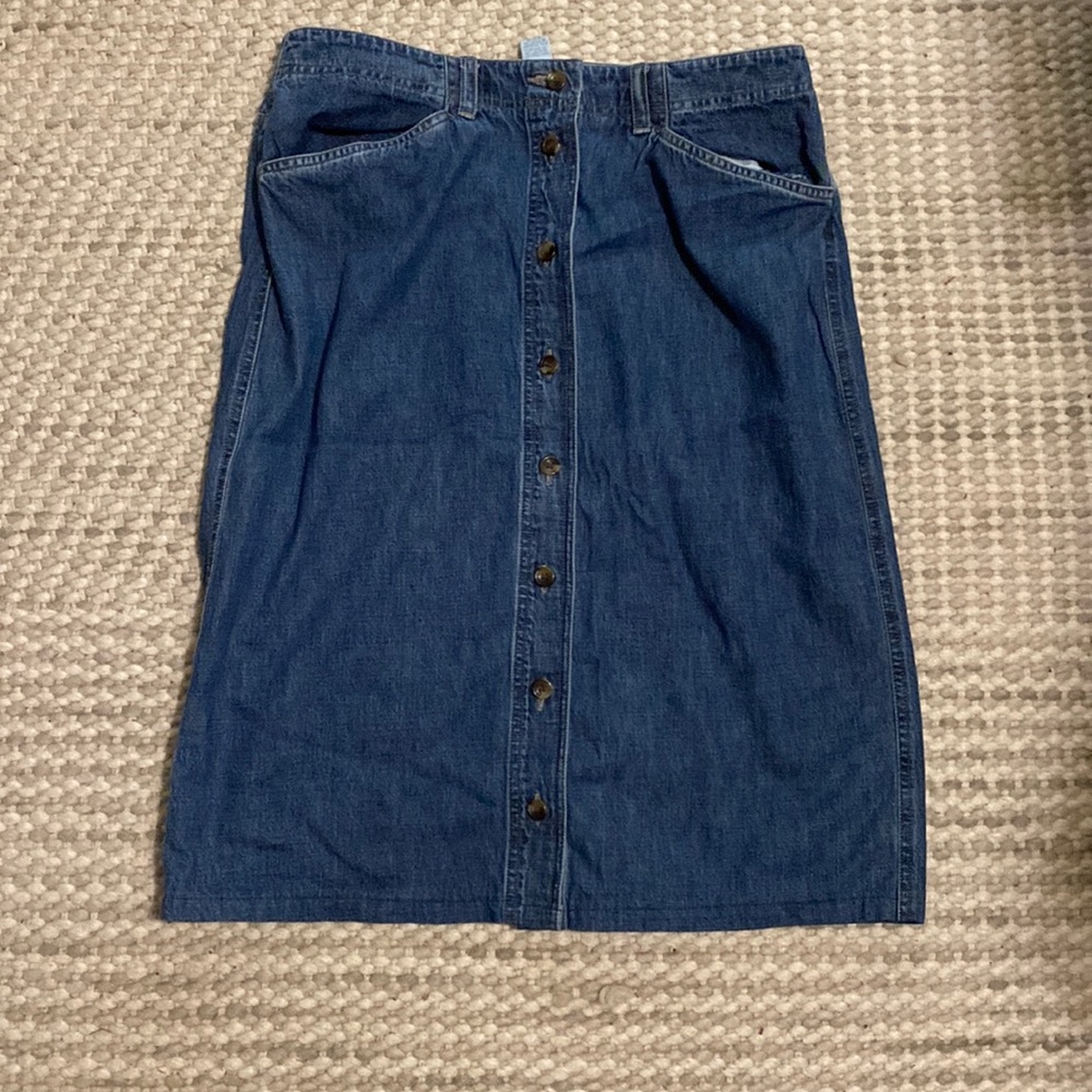 Bogo 50 % off Denim skirt falls just below the knees